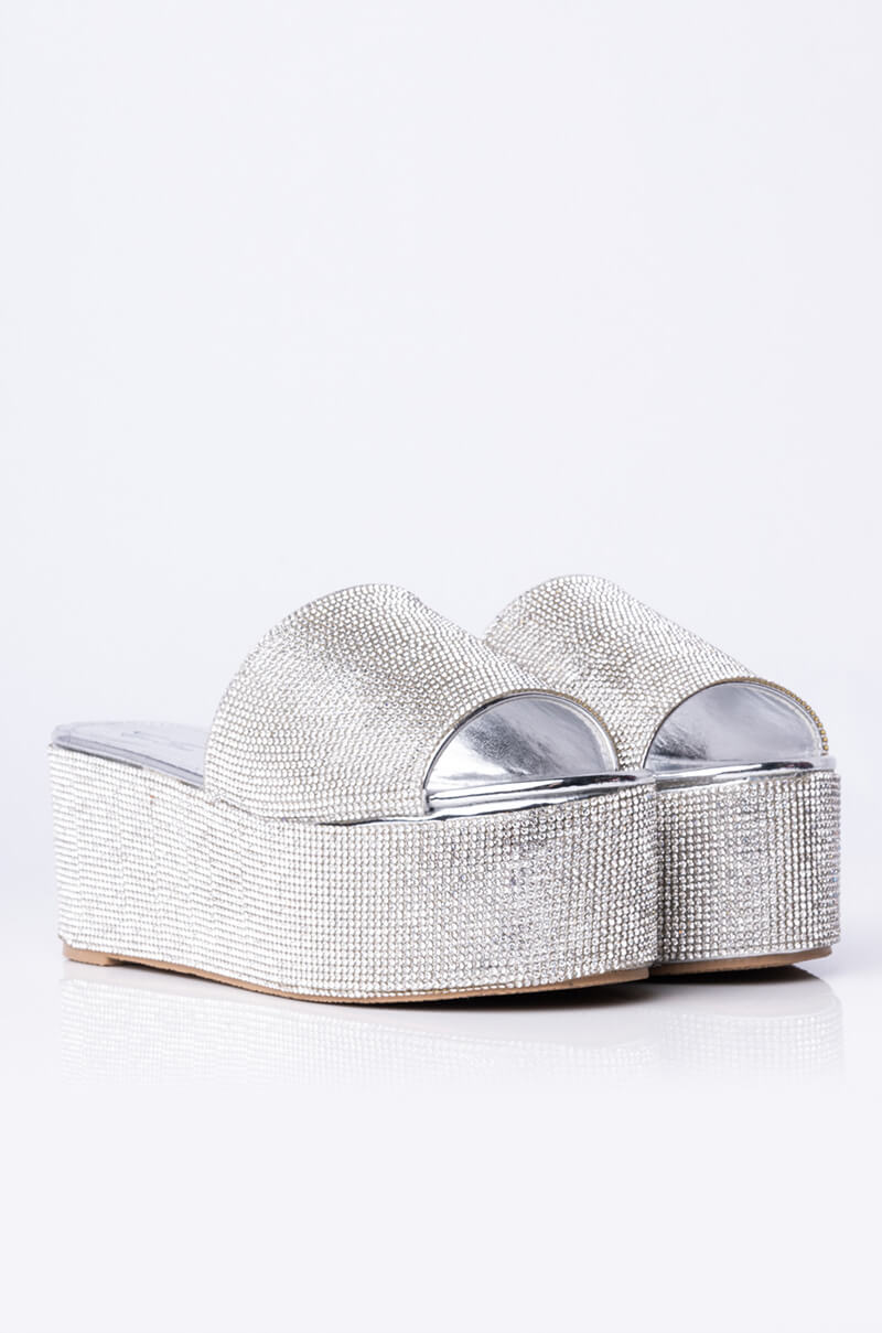 AND ANOTHER ONE SLIP ON FLATFORM SANDAL